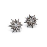 A NEAR PAIR OF LATE 19TH CENTURY DIAMOND STAR EARRINGS