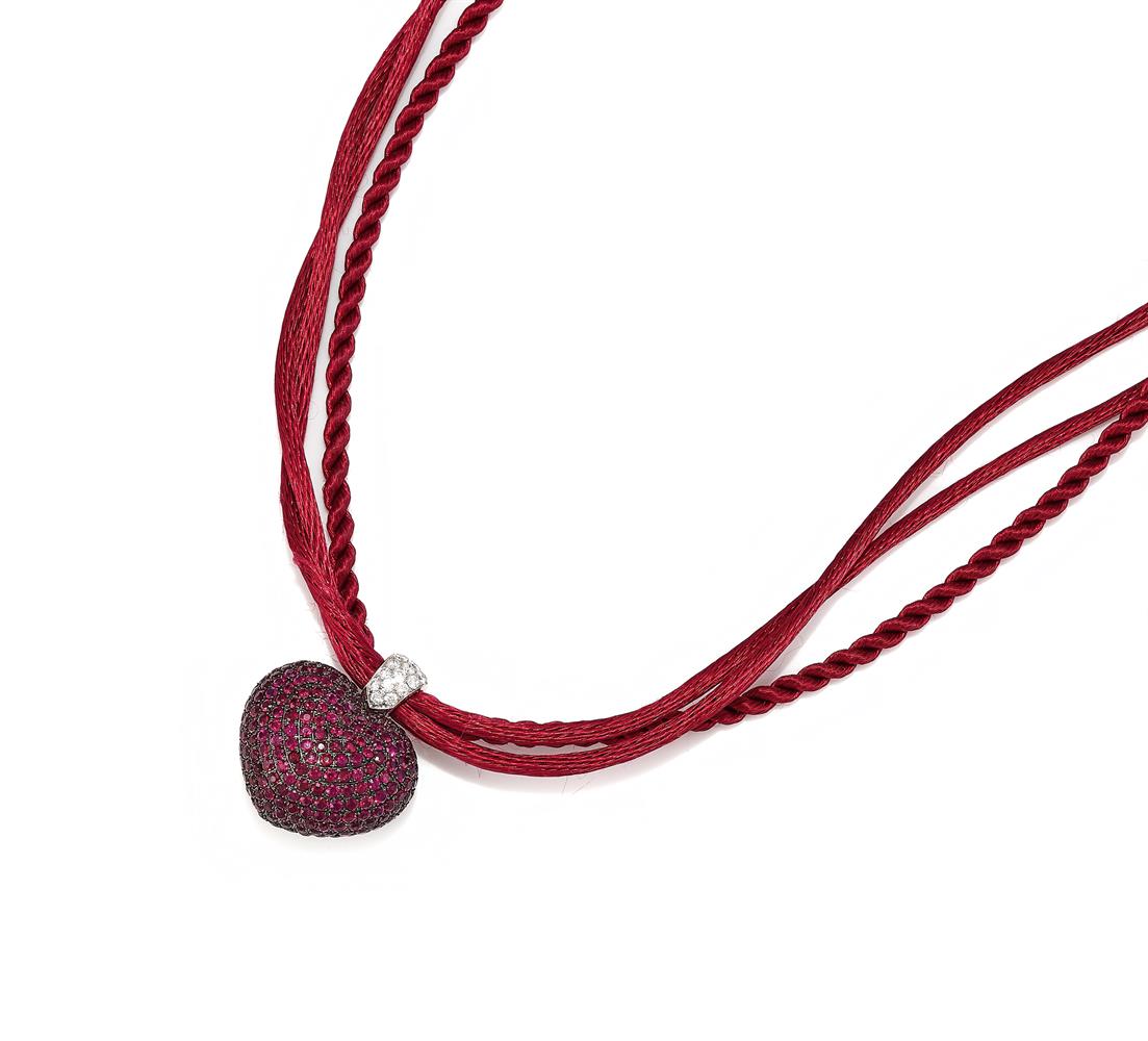 WEMPE, A RUBY AND DIAMOND SET HEART PENDANT