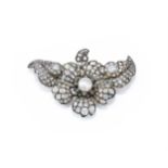 A LATE 19TH CENTURY PEARL AND DIAMOND FLOWER BROOCH