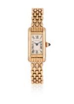 CARTIER, TANK MINI AMERICAINE, REF. 1380, A LADY'S 18 CARAT GOLD BRACELET WATCH