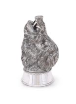 A SILVER STIRRUP CUP IN THE FORM OF A BOARS HEAD