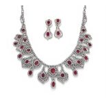 DIANOOR, A RUBY AND DIAMOND NECKLACE AND EARRING SUITE