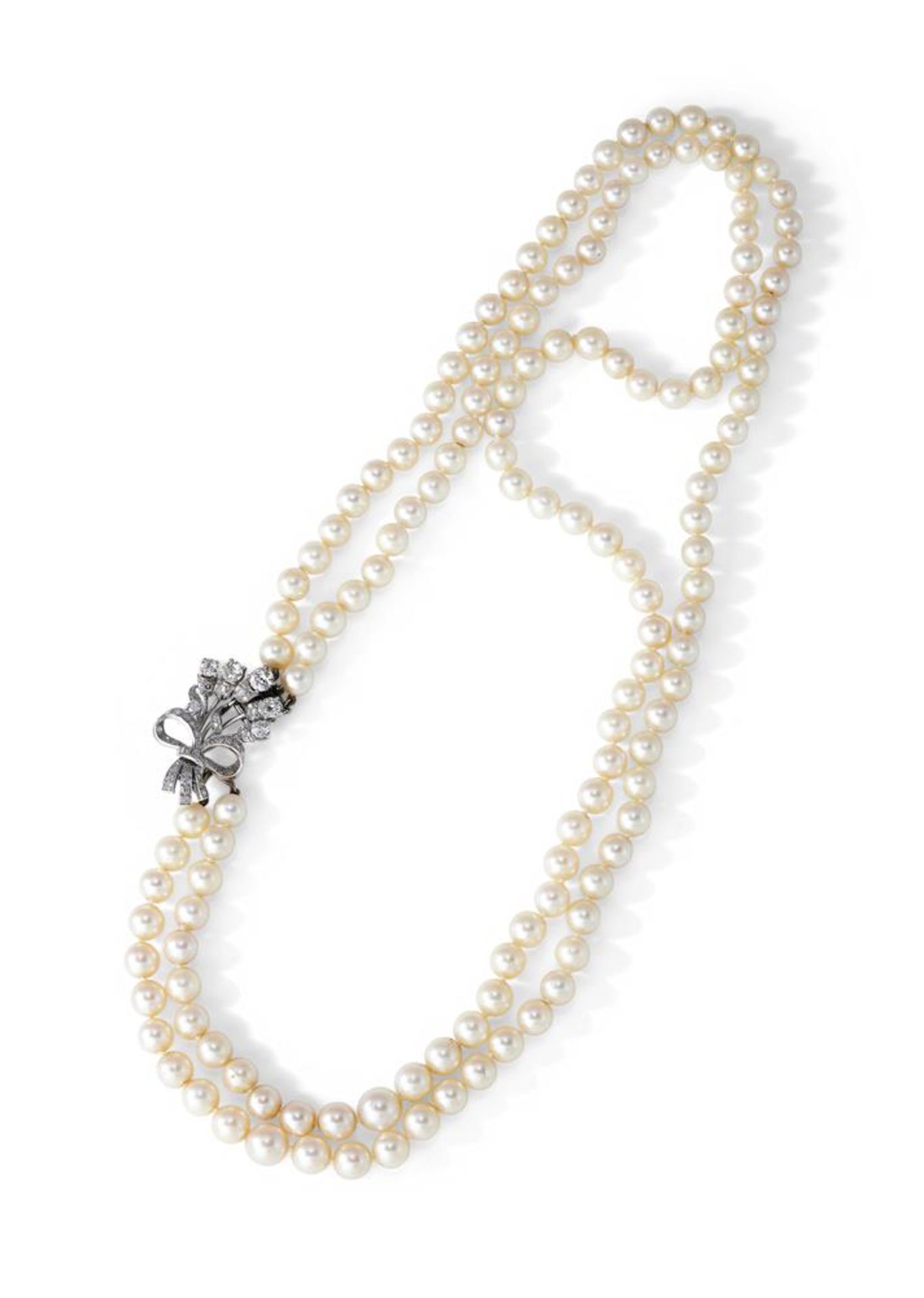 A TWO STRAND CULTURED PEARL AND DIAMOND NECKLACE