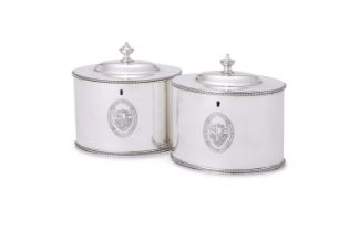 A PAIR OF GEORGE III SILVER OVAL TEA CADDIES