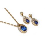 A TANZANITE AND DIAMOND PENDANT NECKLACE AND PAIR OF EARRINGS