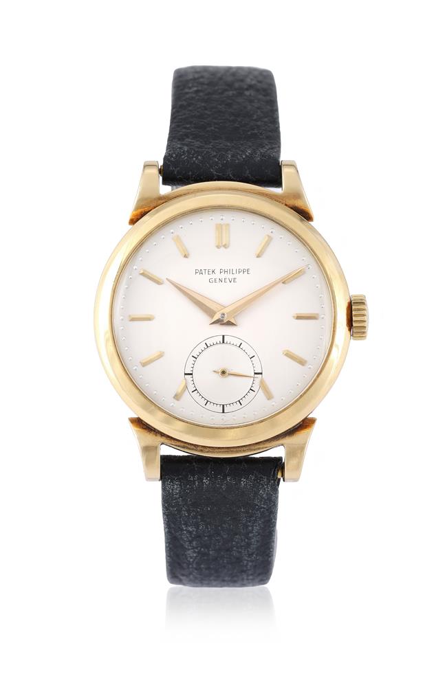 PATEK PHILIPPE, REF. 1491, A RARE GOLD WRISTWATCH WITH SCROLLED LUGS