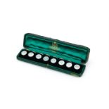 Y A CASED SET OF EIGHT OPAL AND MOTHER-OF-PEARL DRESS BUTTONS