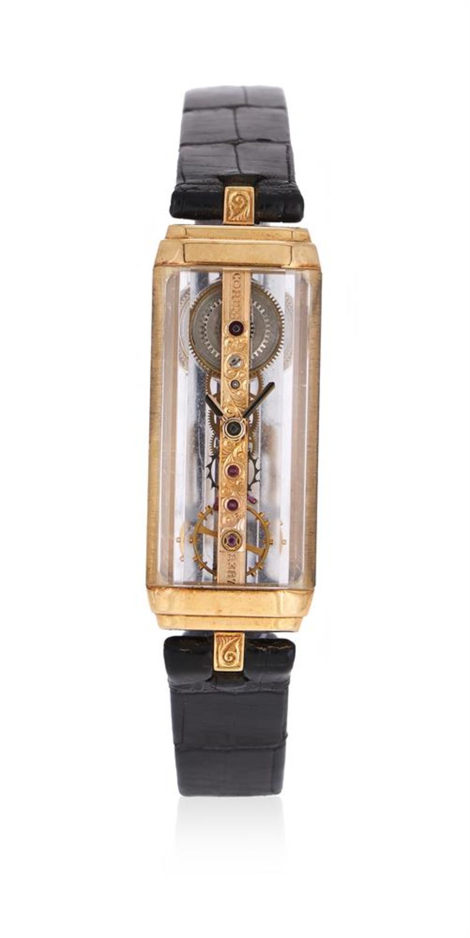 Y CORUM, GOLDEN BRIDGE, A LADY'S 18 CARAT GOLD AND SAPPHIRE CRYSTAL WRISTWATCH