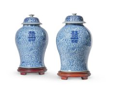 A PAIR OF CHINESE BLUE AND WHITE BALUSTER VASES AND COVERS, 19TH CENTURY