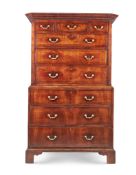 A GEORGE II WALNUT TALL BOY, CIRCA 1740