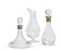 TWO MODERN STERLING SILVER-MOUNTED DECANTERS AND STOPPERS, HALLMARKED FOR SHEFFIELD 2002 AND LONDON