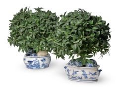 TWO SIMILAR FAUX FOLIAGE DECORATIVE CENTREPIECES, MODERN