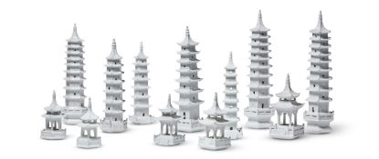A GARNITURE OF TWELVE ASIAN WHITE GLAZED PAGODA TEMPLES, MODERN