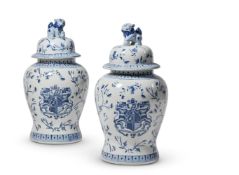 A PAIR OF ASIAN BLUE AND WHITE CRESTED BALUSTER JARS AND COVERS, MODERN