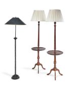 AN EBONISED TURNED STANDING LAMP BASE, MODERN