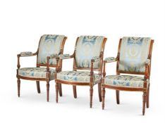 A SET OF THREE STAINED BEECH AND PARCEL GILT FAUTEUILS IN THE MANNER OF JACOB FRERES, 20TH CENTURY
