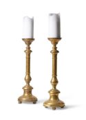 A TALL PAIR OF BRASS TABLE CANDLEHOLDERS, LATE 19TH/EARLY 20TH CENTURY