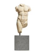 AFTER THE ANTIQUE; A MARBLE DUST COMPOSITION TORSO OF A YOUNG MAN, MODERN
