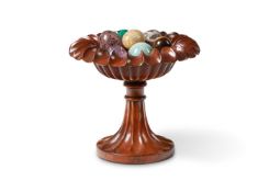 A CARVED WOOD TAZZA WITH A COLLECTION OF HARDSTONE SPECIMENS, MODERN
