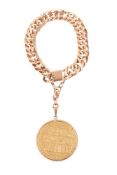 ISRAEL, THEODOR HERZL, A COMMEMORATIVE COIN SUSPENDED FROM A CURB LINK BRACELET