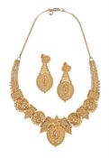 AN INDIAN NECKLACE AND EARRINGS