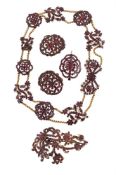 A GARNET COLLAR NECKLACE, BROOCH AND BELT BUCKLE
