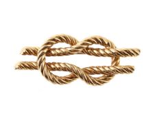 A LOVERS KNOT BROOCH