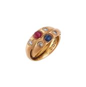 AN 18 CARAT GOLD GEM SET RING