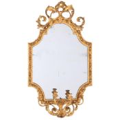 A VICTORIAN GILTWOOD AND COMPOSITION GIRANDOLE MIRROR, CIRCA 1860