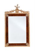 A MAHOGANY AND PARCEL GILT WALL MIRROR IN EMPIRE STYLE, 19TH CENTURY