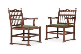 A MATCHED PAIR OF BEECH 'GARDEN' CHAIRS, TWO DESIGNS BY INCE & MAYHEW