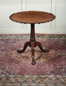 A GEORGE II MAHOGANY 'PIE CRUST' TRIPOD TABLE, CIRCA 1750