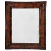A WILLIAM & MARY OLIVEWOOD 'OYSTER' VENEERED MIRROR, CIRCA 1690