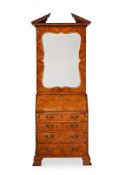 A FIGURED WALNUT BUREAU BOOKCASE, IN GEORGE II STYLE, LATE 19TH OR EARLY 20TH CENTURY