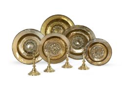 A GROUP OF FIVE NUREMBURG BRASS ALMS DISHES, 17TH CENTURY