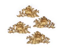 A SET OF FOUR CARVED GILTWOOD OVERDOORS, CONTINENTAL, LATE 18TH CENTURY OR EARLY 19TH CENTURY