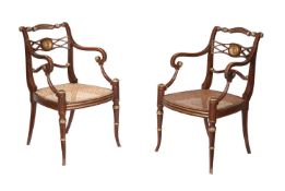 A PAIR OF REGENCY SIMULATED ROSEWOOD AND PARCEL GILT ARMCHAIRS, IN THE MANNER OF GILLOWS, CIRCA 1820