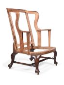 A GEORGE II MAHOGANY WING ARMCHAIR, CIRCA 1750