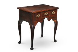A GEORGE II MAHOGANY AND 'FUSTIC' MAHOGANY CROSSBANDED SIDE TABLE, CIRCA 1740