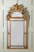 A LARGE RÉGENCE CARVED GILTWOOD MIRROR, CIRCA 1720