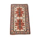 A KAZAK RUG approximately 175 x 95cm