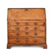 A GEORGE I ELM AND BURR ELM BUREAU, CIRCA 1720