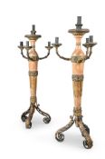 A PAIR OF ITALIAN GILTWOOD, POLYCHROME PAINTED, WROUGHT IRON AND PARCEL GILT TORCHERES, 18TH CENTURY