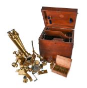A VICTORIAN LACQUERED BRASS BINOCULAR CHEST MICROSCOPE