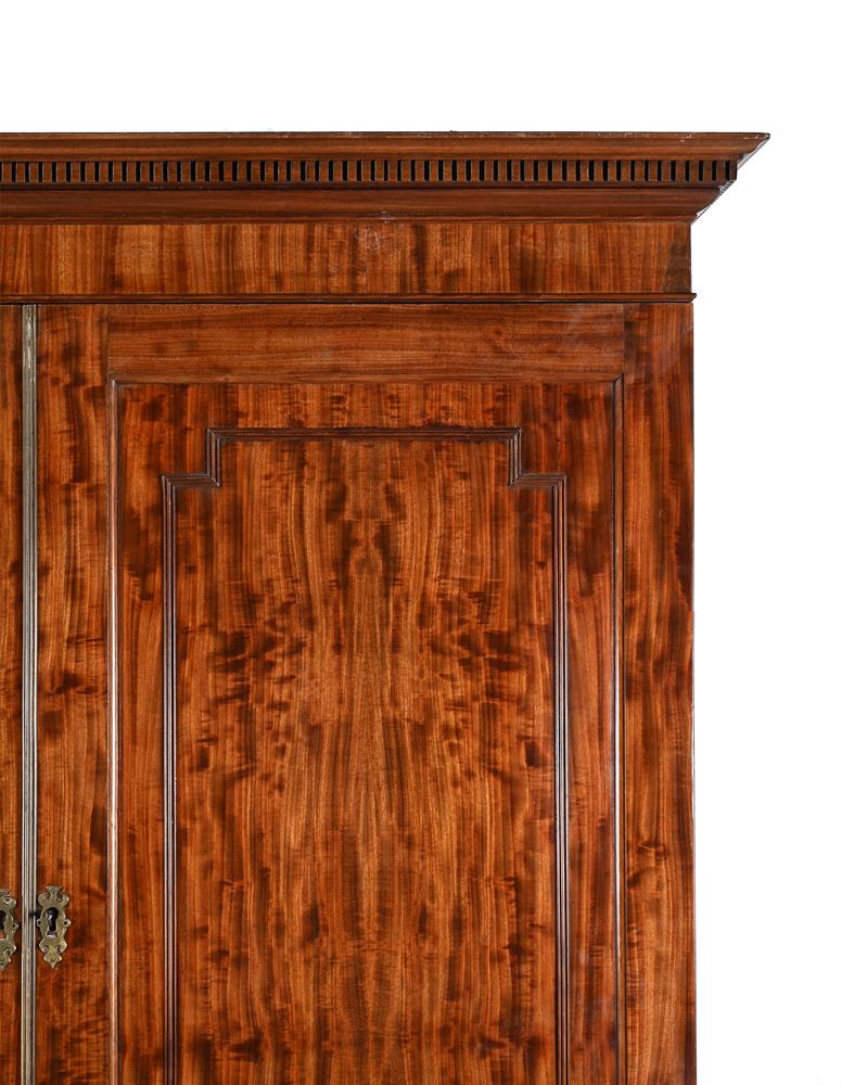 A GEORGE III FIGURED MAHOGANY CLOTHES PRESS, IN THE MANNER OF GILLOWS, CIRCA 1790 - Image 2 of 3