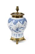 A DUTCH DELFT BLUE AND WHITE VASE, LATER CONVERTED TO A LAMP, CIRCA 1700