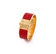 HERMÈS, 'CHARNIERE', A RED AND GILT HINGED BANGLE