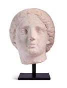 A ROMAN WHITE MARBLE HEAD OF A WOMAN, 1ST/2ND CENTURY A.D.