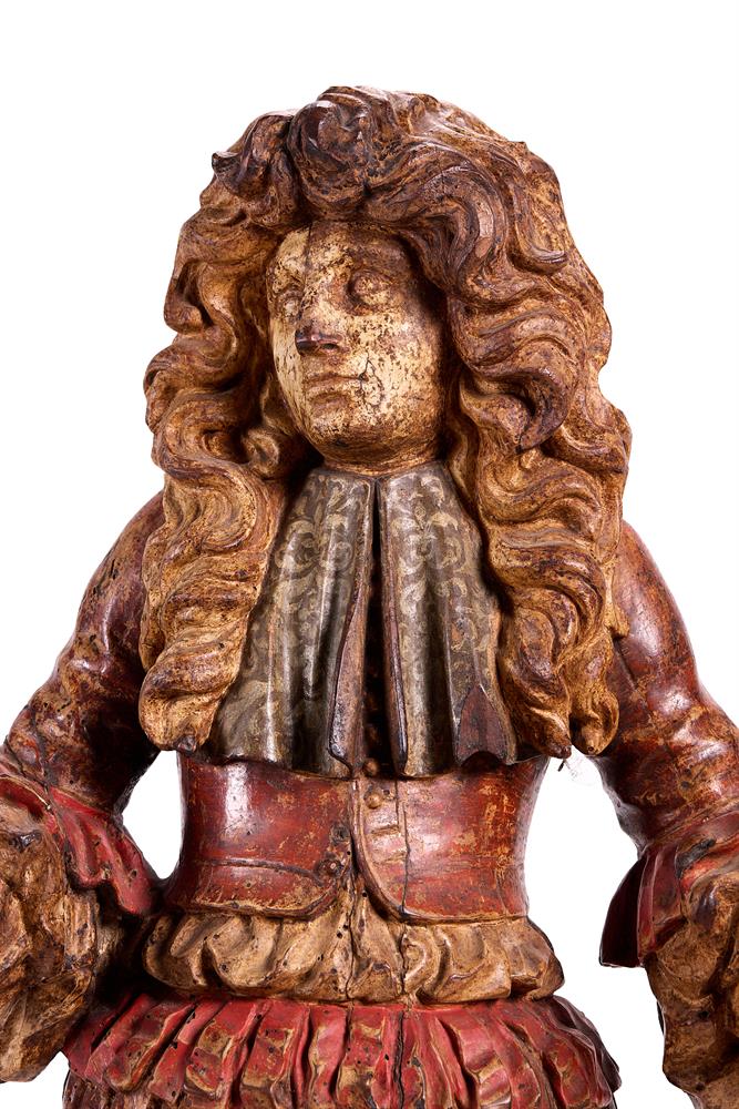 A LARGE PAIR OF CARVED, POLYCHROMED AND GILTWOOD FIGURES OF GENTLEMEN, ITALIAN, CIRCA 1680 - Image 4 of 5