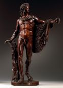 AFTER THE ANTIQUE- A CARVED FRUITWOOD FIGURE OF THE APOLLO BELVEDERE